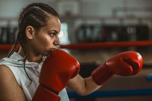 Luva de couro x luva sintética: qual o melhor material para treinar artes marciais?